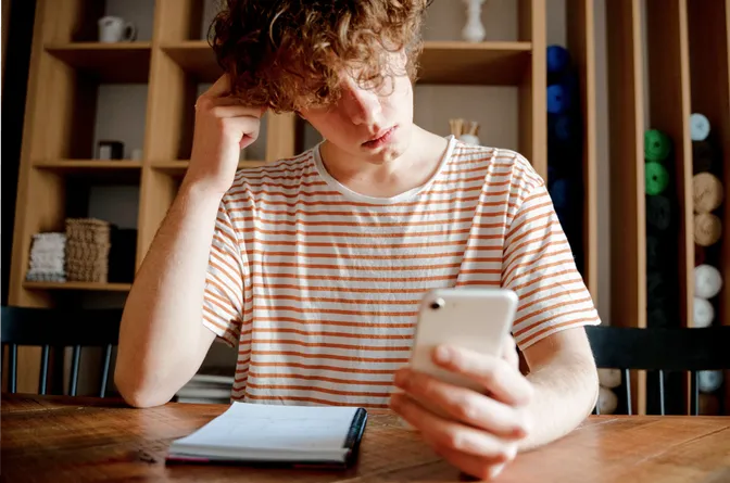 Student with combined type ADHD showing both inattentive and hyperactive traits in classroom