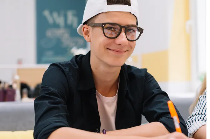 Student with hyperactive ADHD being the class clown in classroom