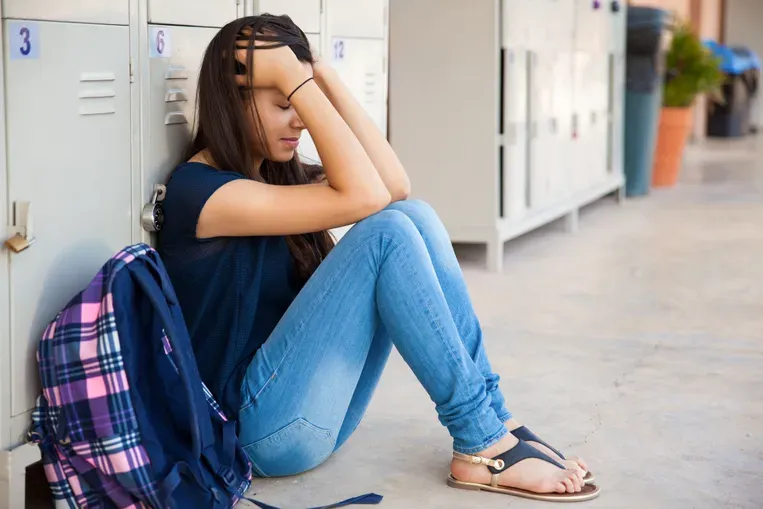 Teenage girl stressed about high school